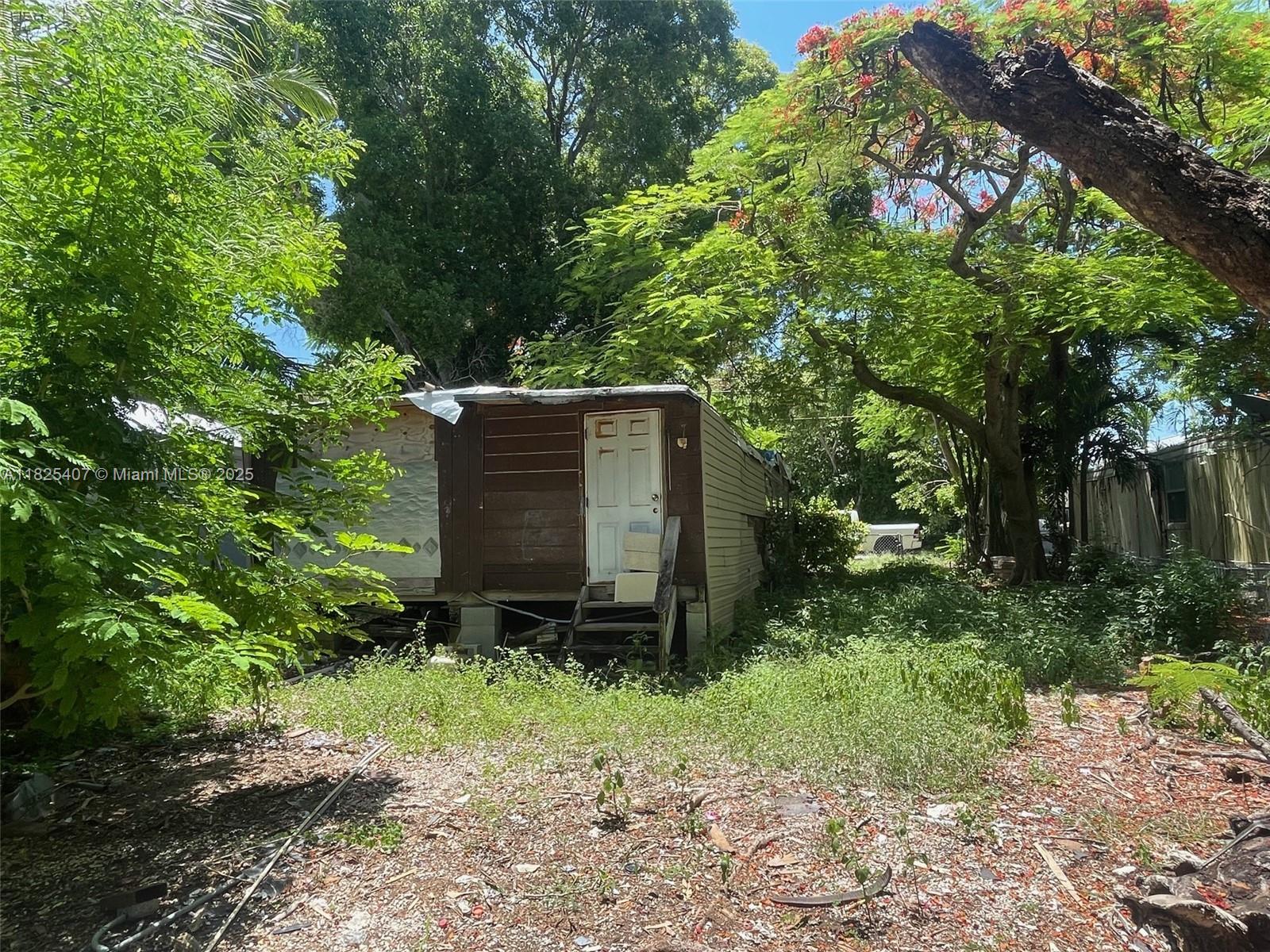 Lake Surprise Estates Key Largo, FL 33037 - Photo 4 of 6 a view of outdoor space and garden