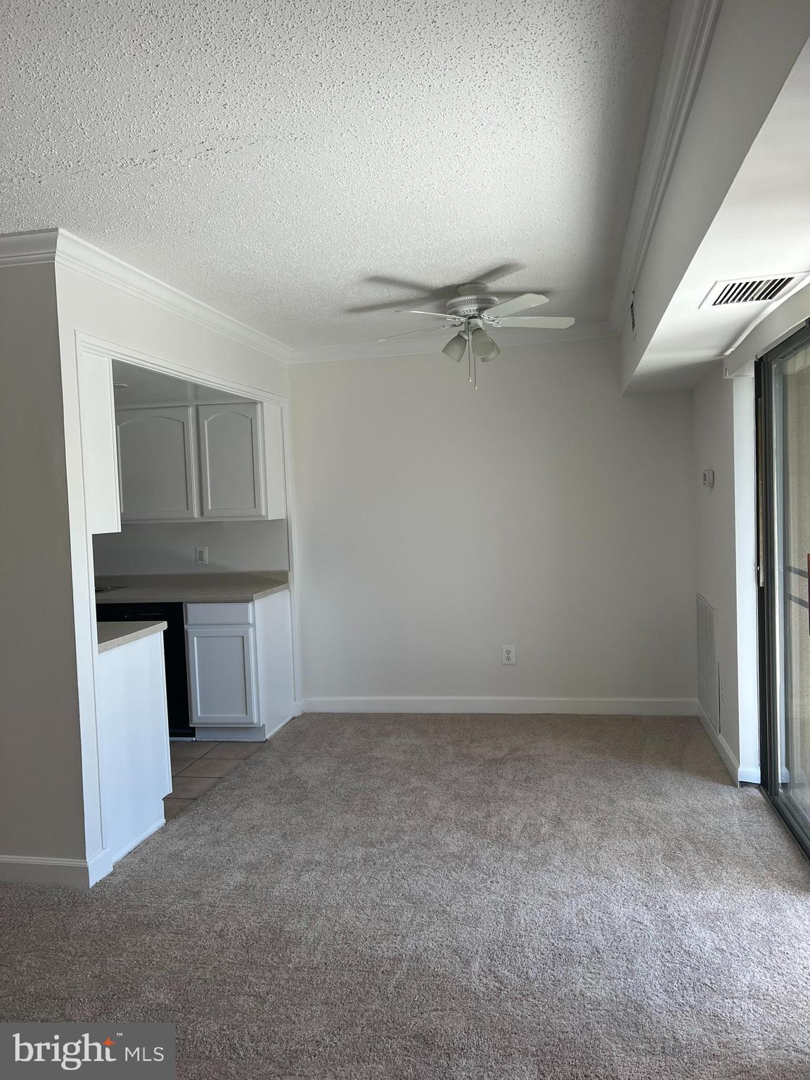 11601 Stoneview Square, Unit 61/12C Reston, VA 20191 - Photo 8 of 8 Family Room to Dining Room