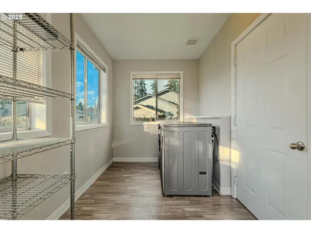 a room with window and mirror