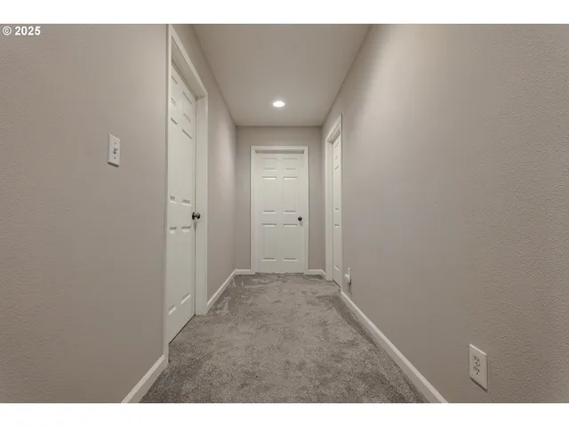 a view of hallway with an empty space