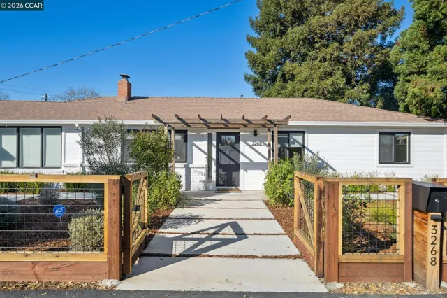 a front view of a house with a porch