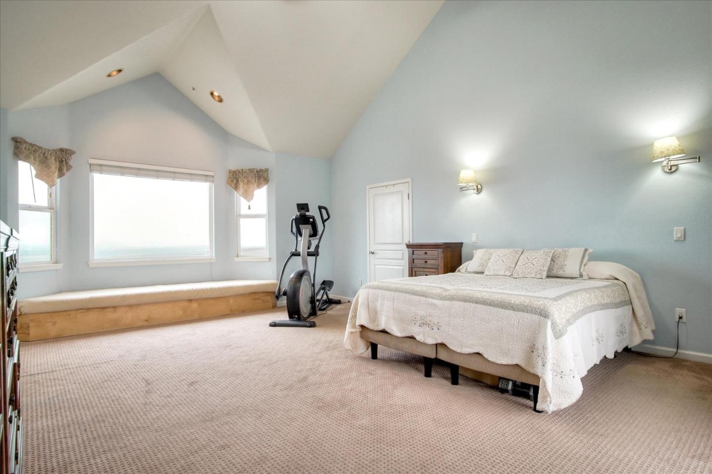 35635 Eagle Ridge Soledad, CA 93960 - Photo 19 of 50 a spacious bedroom with a bed and a window