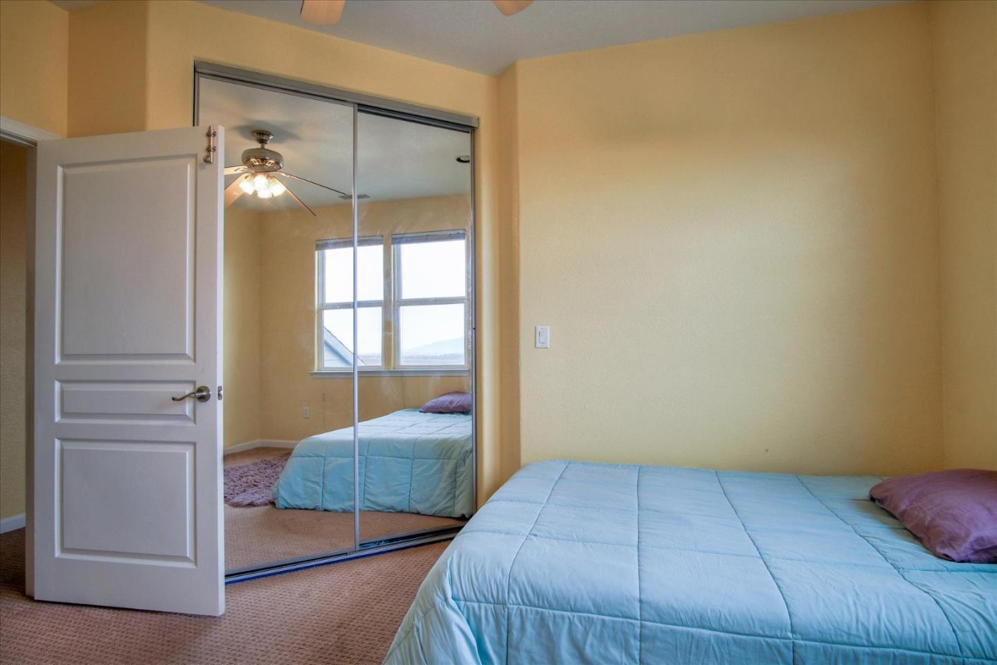 35635 Eagle Ridge Soledad, CA 93960 - Photo 35 of 50 a bedroom with a bed and a window