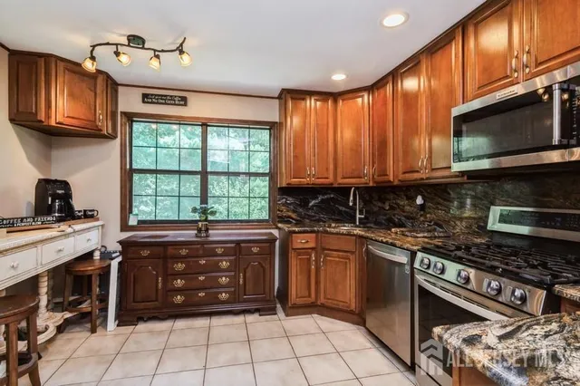 $586,000 | 56 Dortmunder Drive, Manalapan, NJ 07726