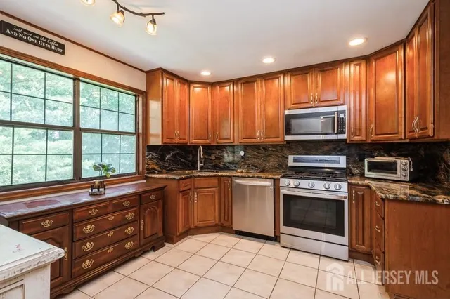 $586,000 | 56 Dortmunder Drive, Manalapan, NJ 07726