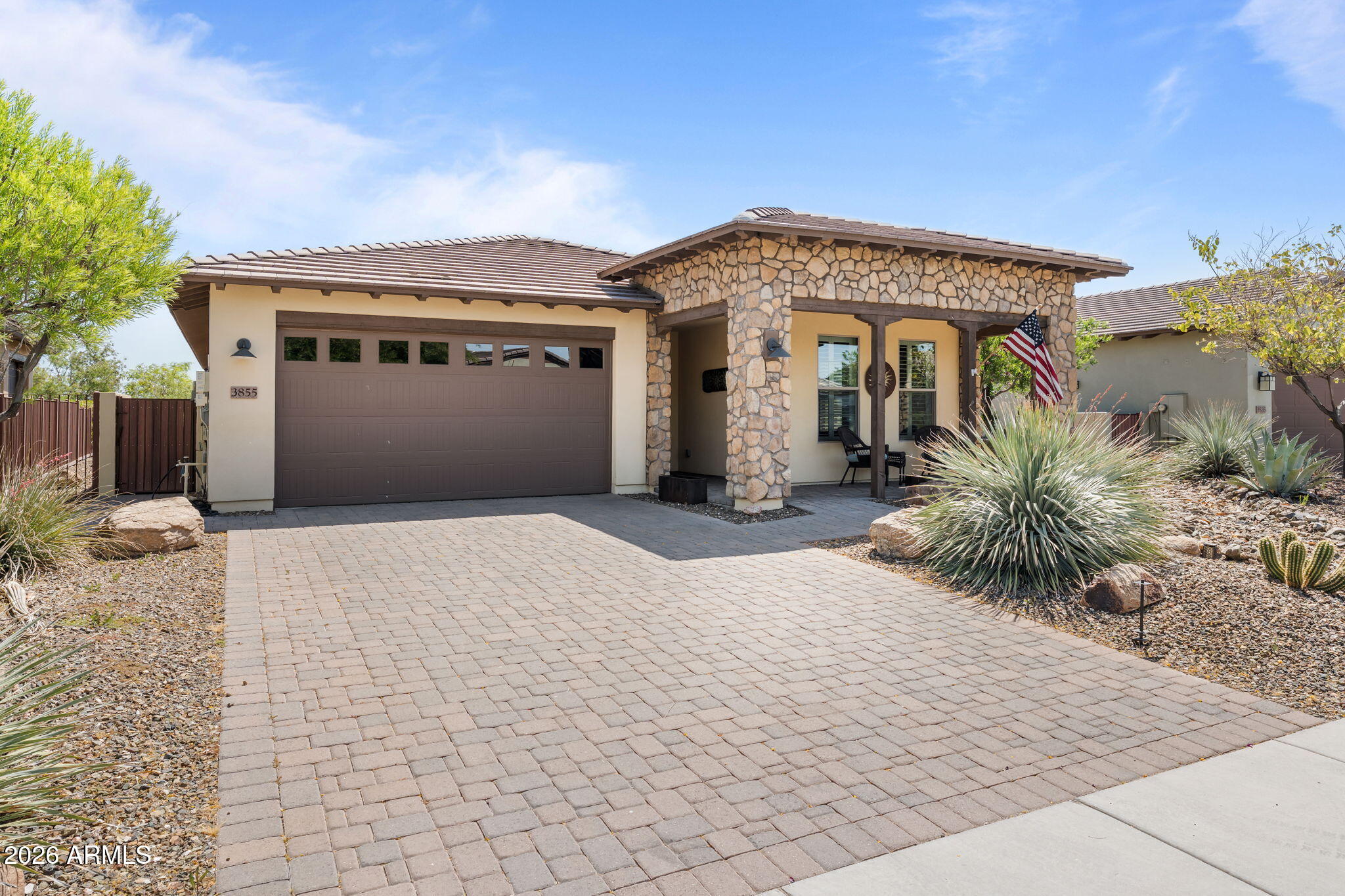 3855 Gold Ridge Road Wickenburg, AZ 85390 - Photo 1 of 38 a front view of a house with a yard