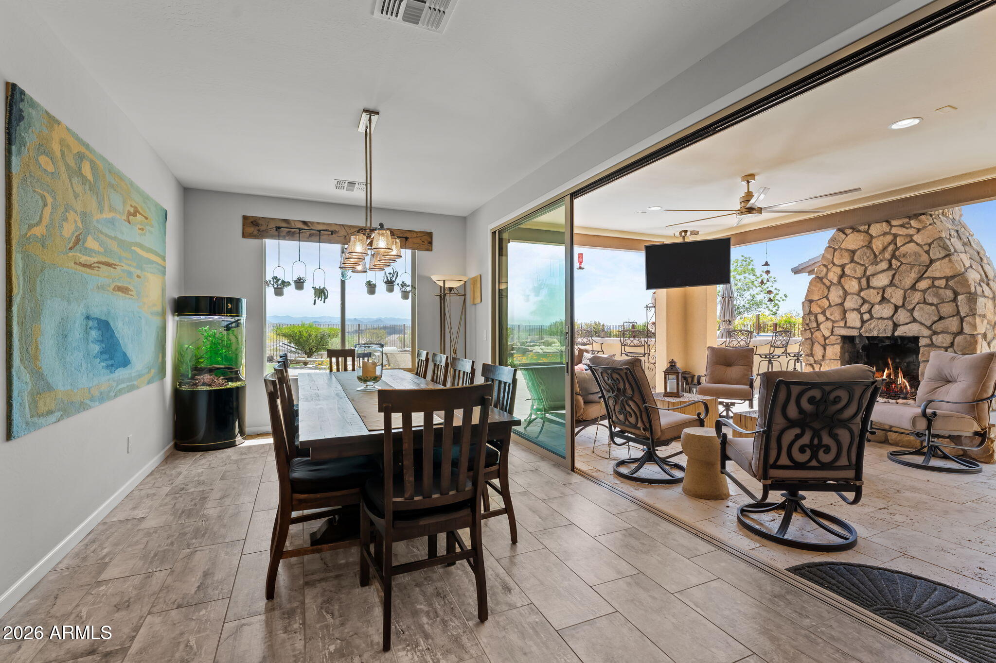 3855 Gold Ridge Road Wickenburg, AZ 85390 - Photo 17 of 38 a view of a dining room with furniture window and outside view