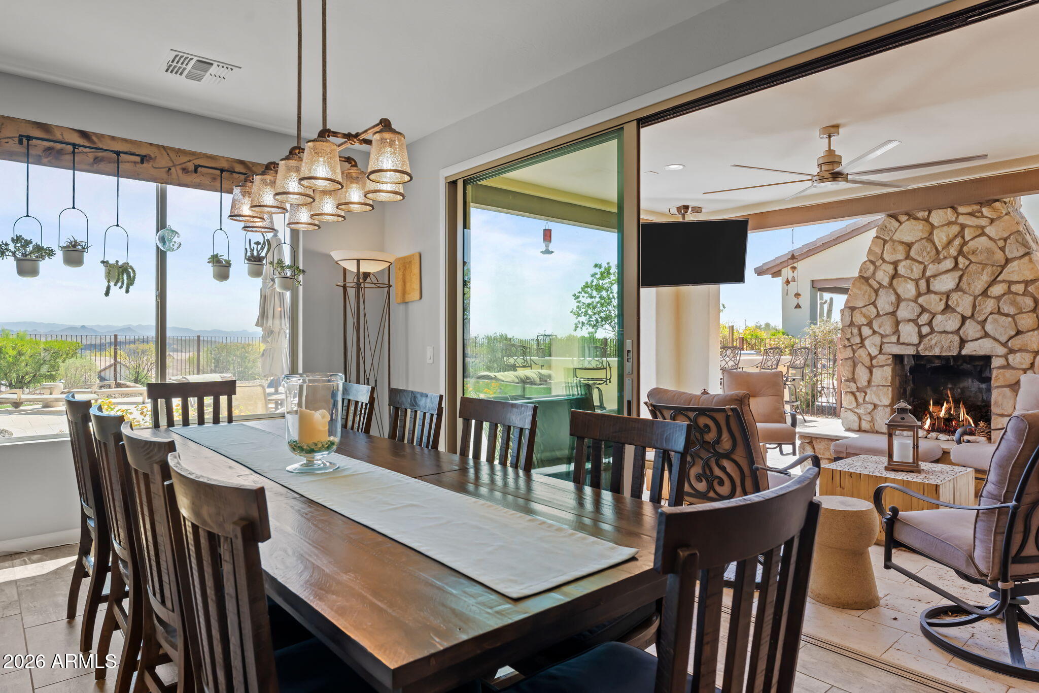3855 Gold Ridge Road Wickenburg, AZ 85390 - Photo 18 of 38 a view of a dining room with furniture window and outside view