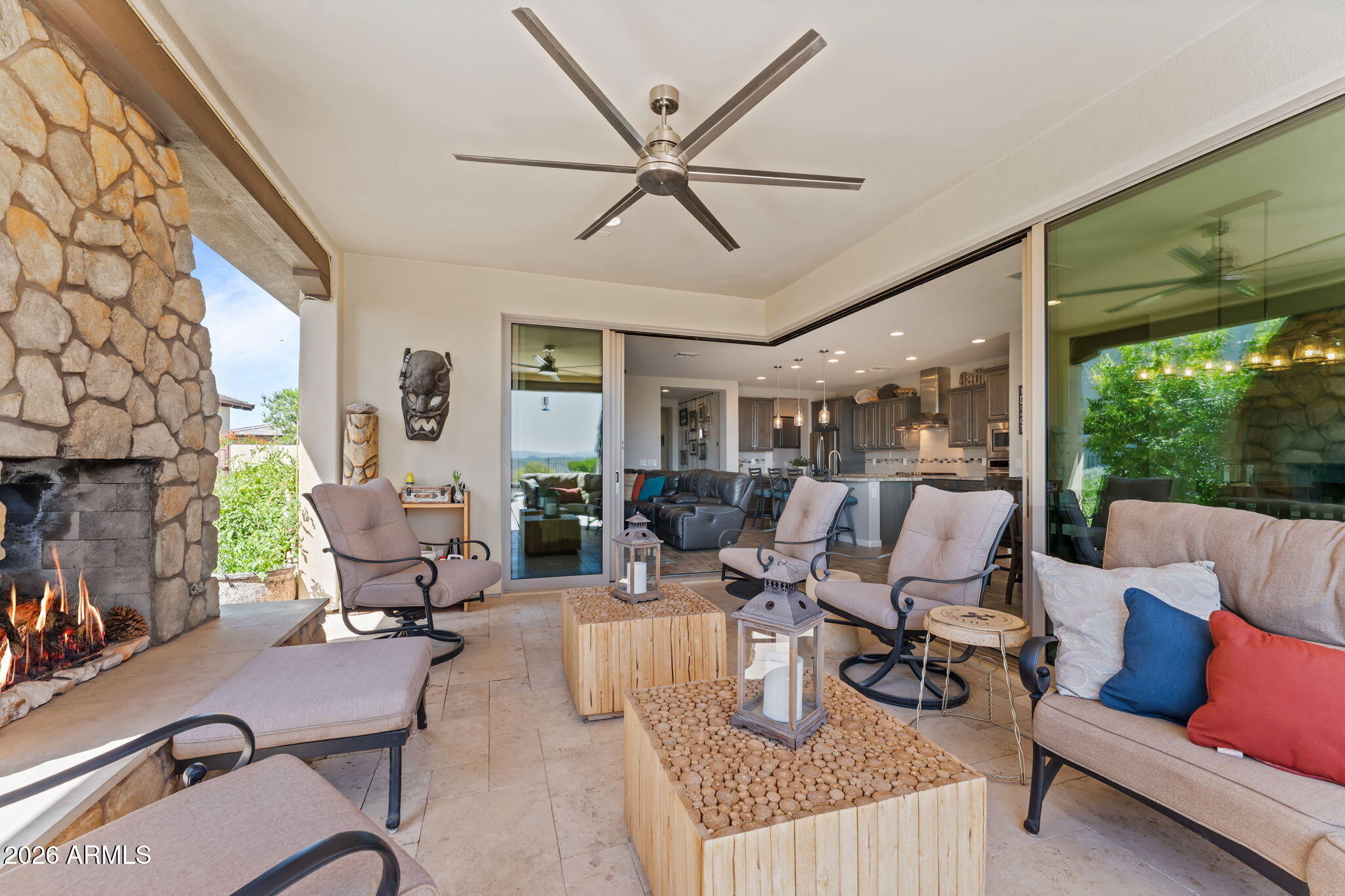 3855 Gold Ridge Road Wickenburg, AZ 85390 - Photo 28 of 38 a living room with furniture and three large window