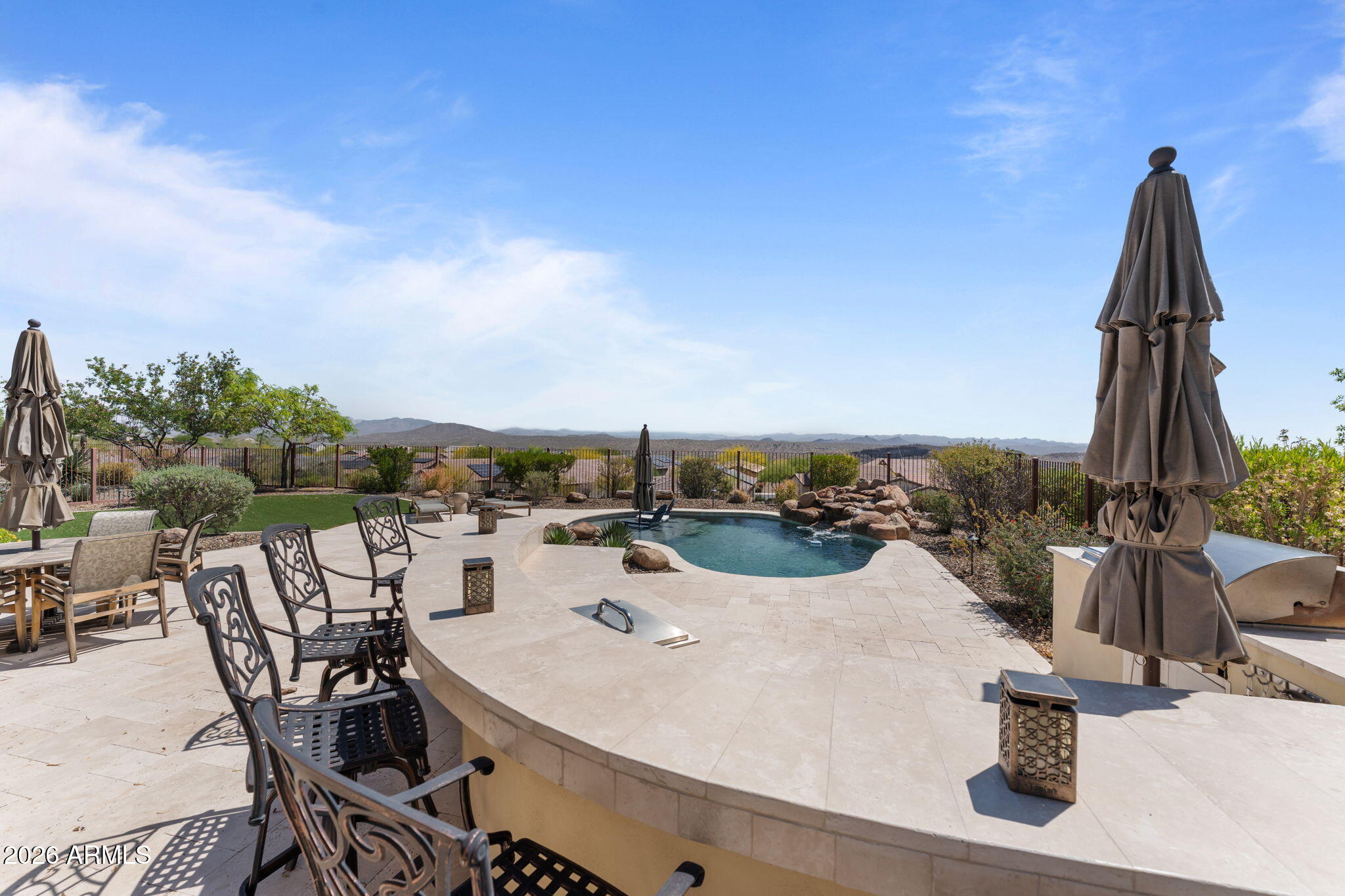 3855 Gold Ridge Road Wickenburg, AZ 85390 - Photo 29 of 38 a view of a terrace with furniture