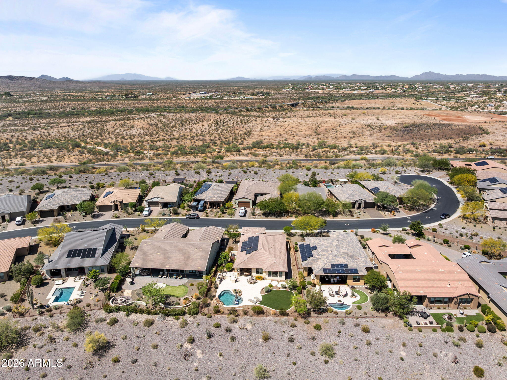3855 Gold Ridge Road Wickenburg, AZ 85390 - Photo 36 of 38 an aerial view of residential building and lake view