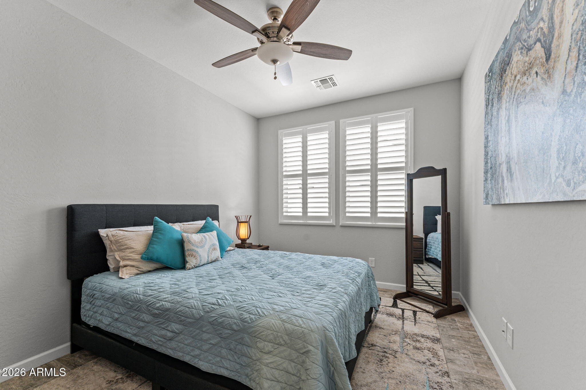 3855 Gold Ridge Road Wickenburg, AZ 85390 - Photo 10 of 38 a bedroom with a bed and a window