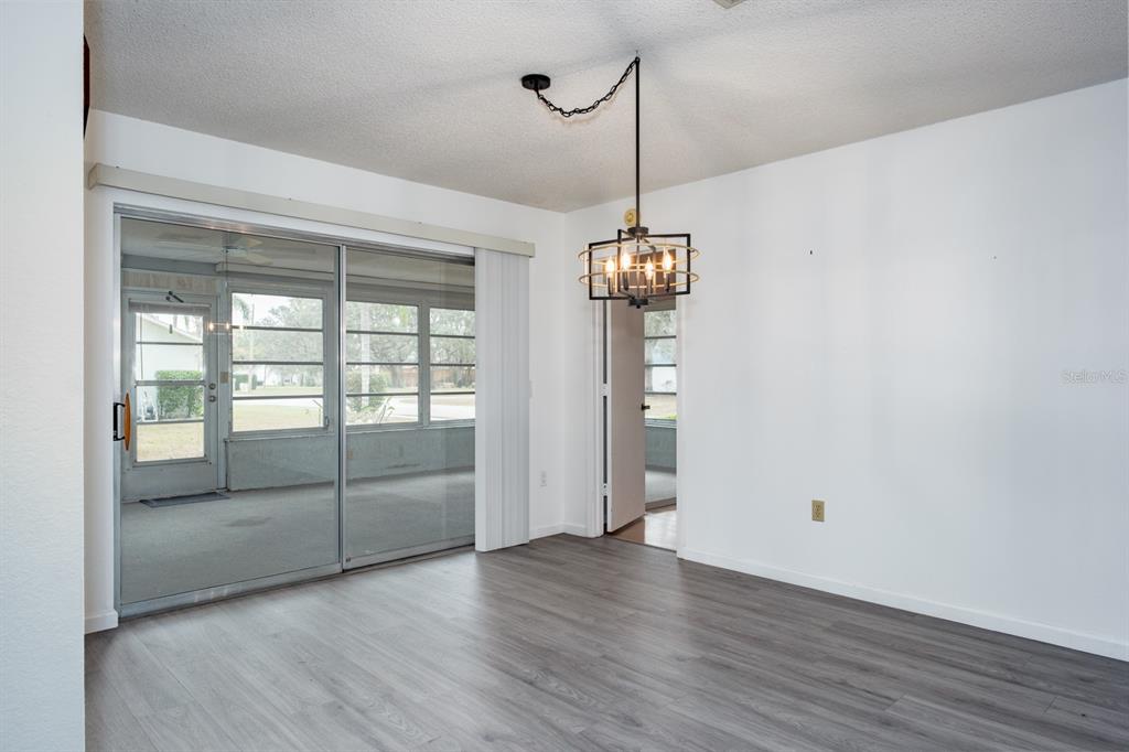 4814 Prince George Circle New Port Richey, FL 34655 - Photo 13 of 75 a view of an empty room with a window