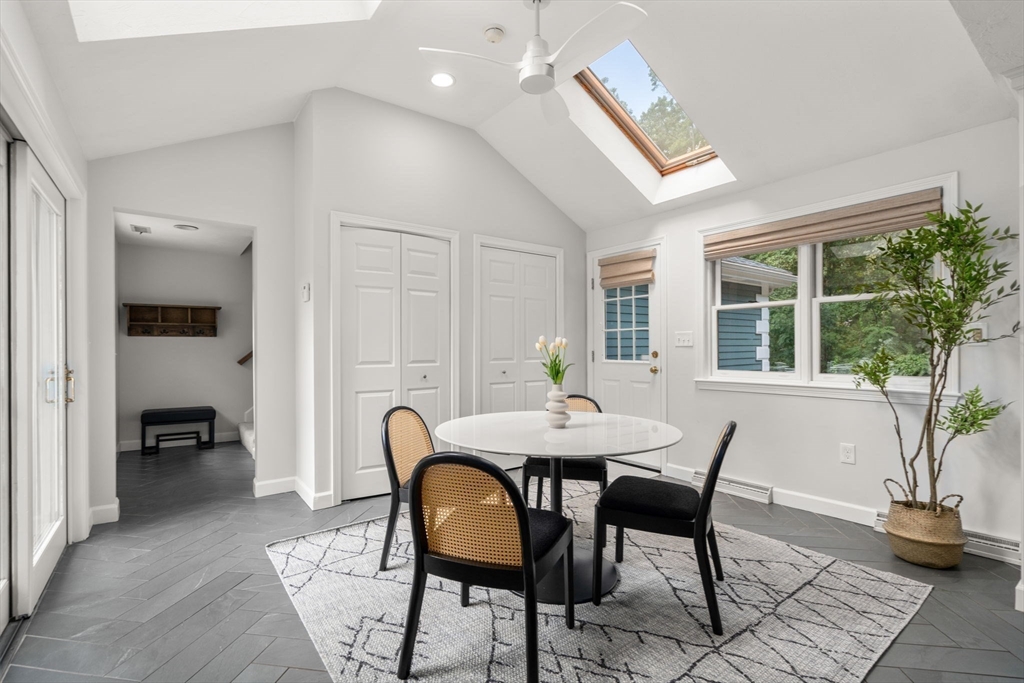 429 Warren Street Needham, MA 02492 - Photo 15 of 40 a view of a dining room with furniture and a window