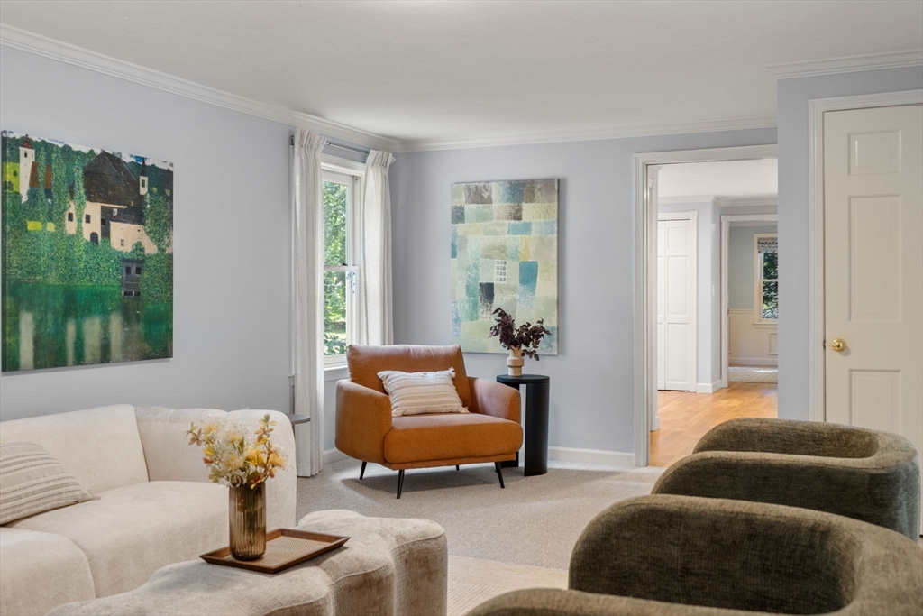 429 Warren Street Needham, MA 02492 - Photo 17 of 40 a living room with furniture and a potted plant