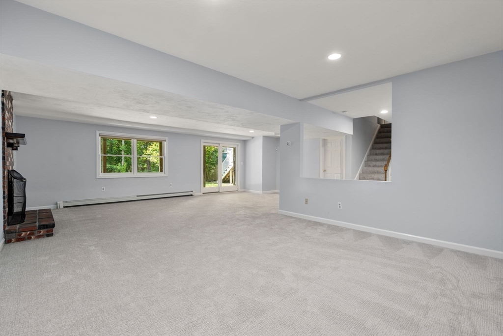 429 Warren Street Needham, MA 02492 - Photo 32 of 40 a view of an empty room with a window
