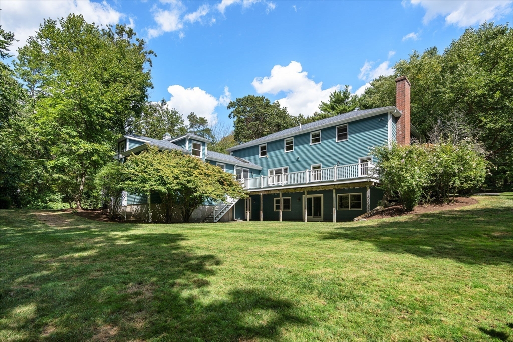 429 Warren Street Needham, MA 02492 - Photo 37 of 40 a view of a house with a big yard