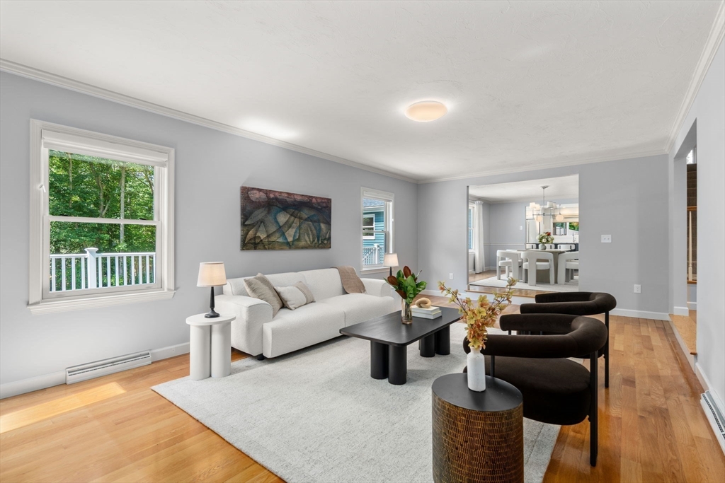 429 Warren Street Needham, MA 02492 - Photo 8 of 40 a living room with furniture and a window