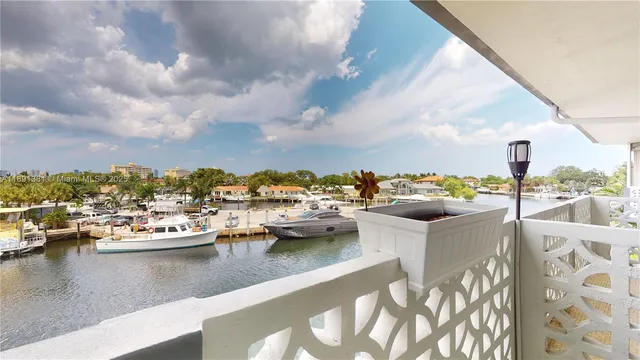a view of swimming pool with outdoor seating