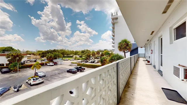 a view of a balcony with many windows
