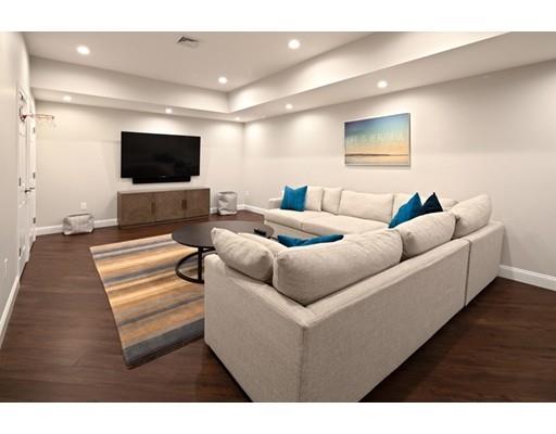 3 Gardner Terrace Hingham, MA 02043 - Photo 27 of 29 a living room with furniture and a flat screen tv