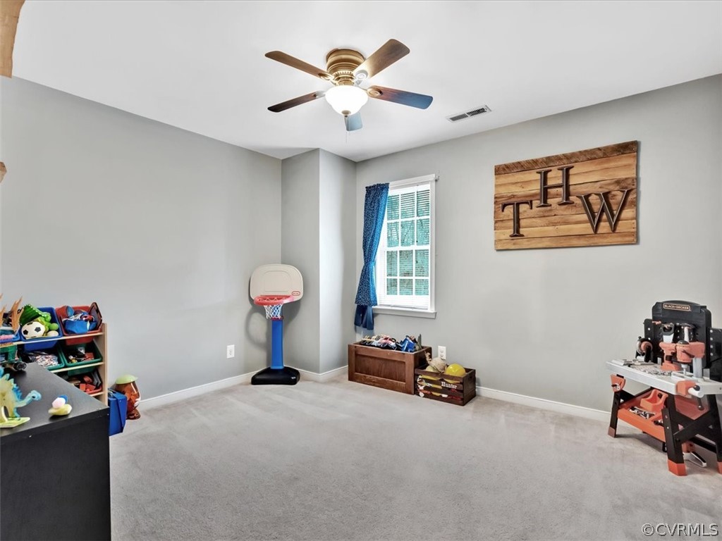 11307 Corte Castle Road Chesterfield, VA 23838 - Photo 23 of 41 a bedroom with a bed and a chandelier