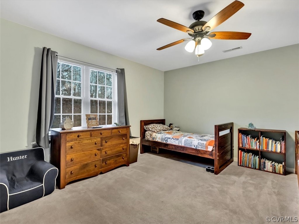 11307 Corte Castle Road Chesterfield, VA 23838 - Photo 25 of 41 a bedroom with furniture and a window