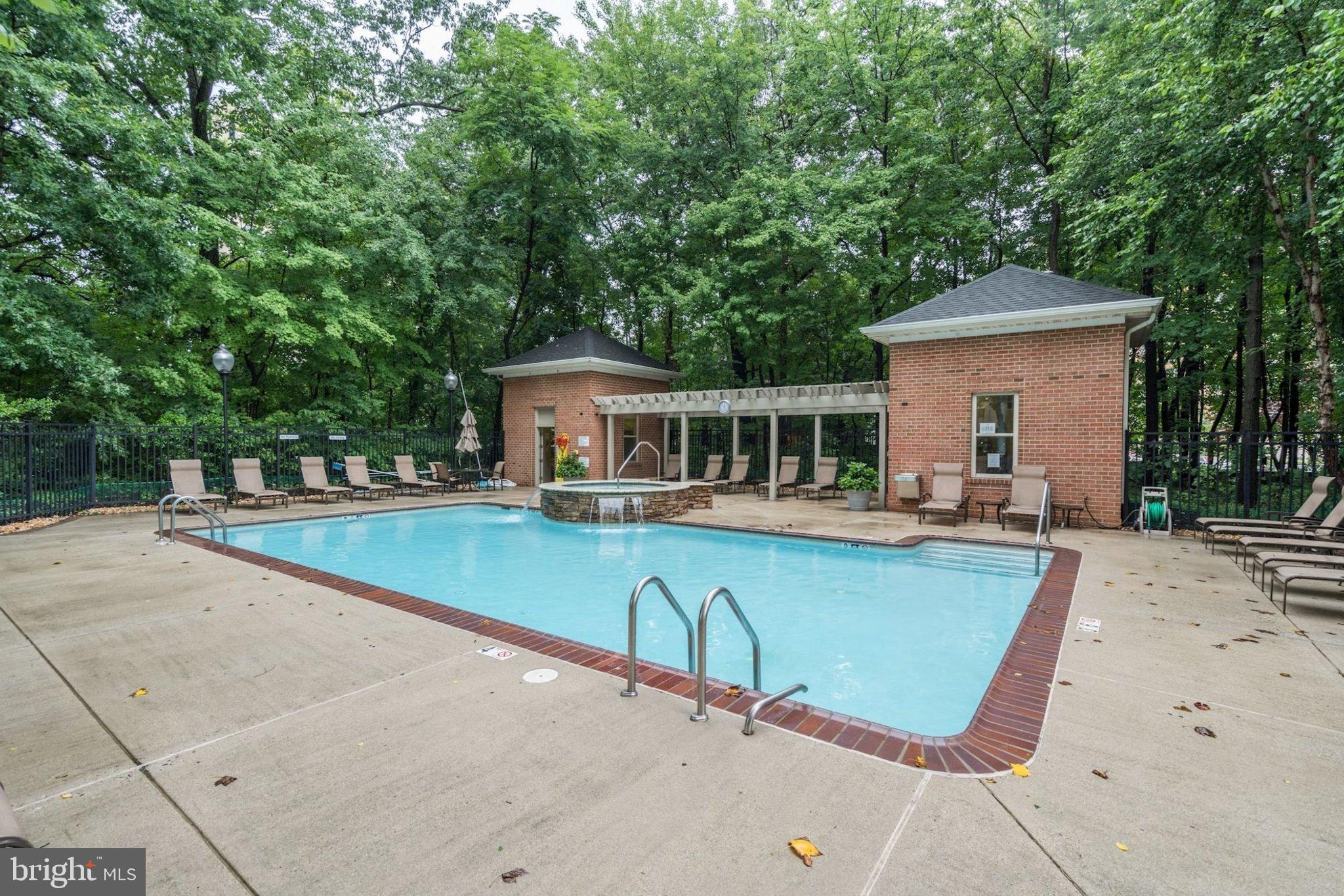 11776 Stratford House Place, Unit 807 Reston, VA 20190 - Photo 20 of 25 a view of a house with swimming pool