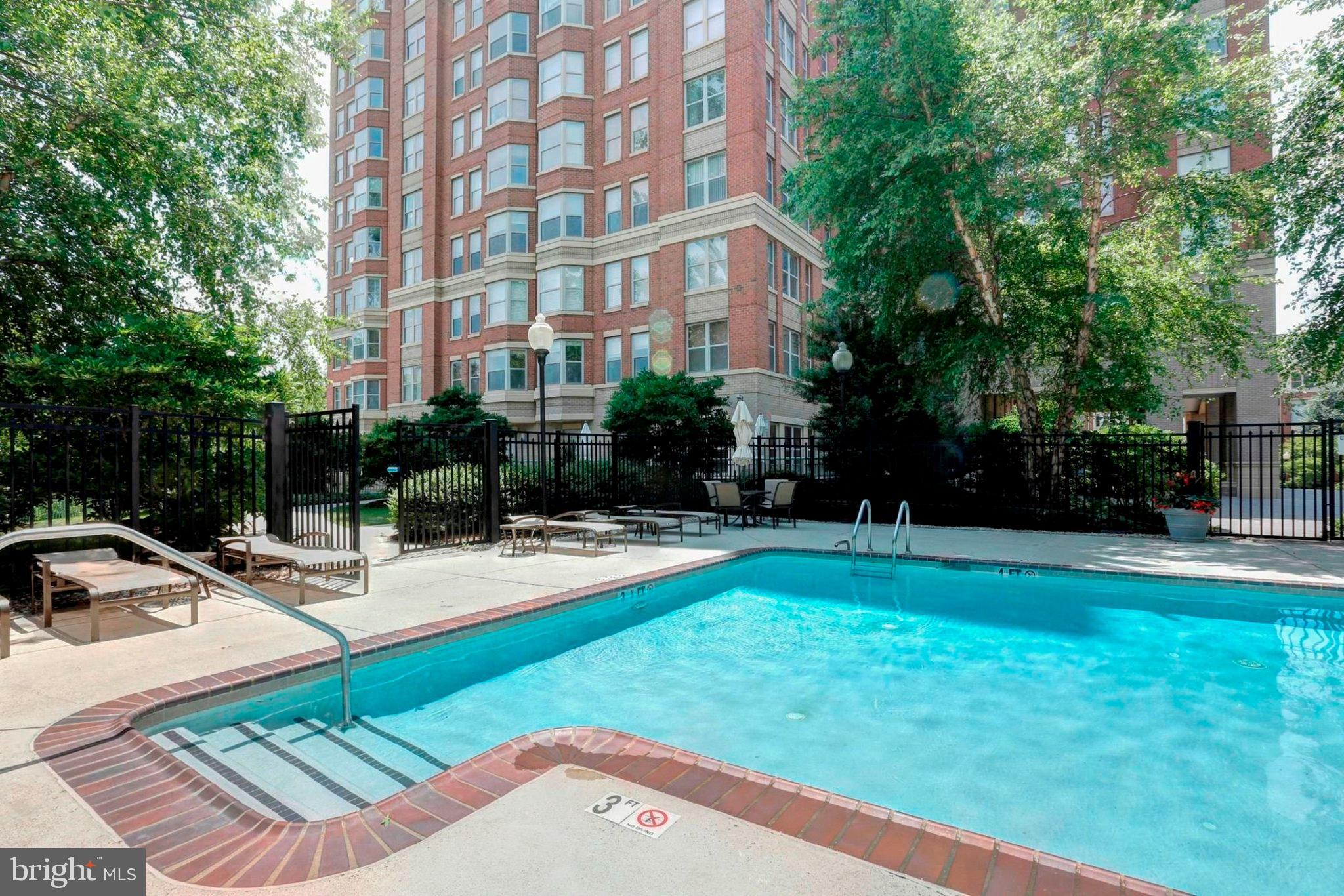 11776 Stratford House Place, Unit 807 Reston, VA 20190 - Photo 21 of 25 a view of a house with backyard and sitting area