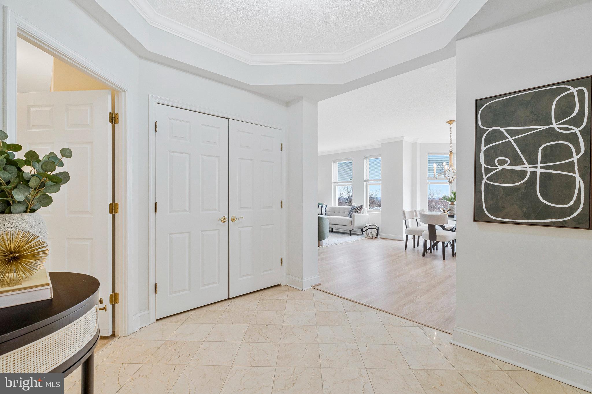11776 Stratford House Place, Unit 807 Reston, VA 20190 - Photo 3 of 25 a view of livingroom with furniture and entryway