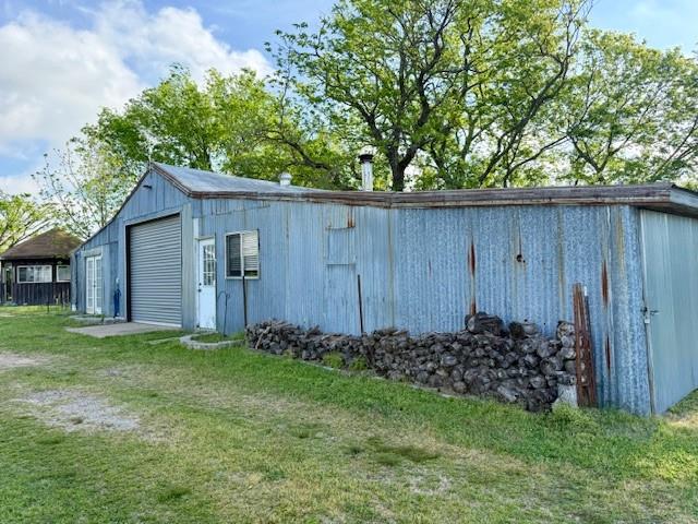 4782 Highway 19 Emory, TX 75440 - Photo 5 of 28 Workshop with electricity, plumbing and wood burning stove