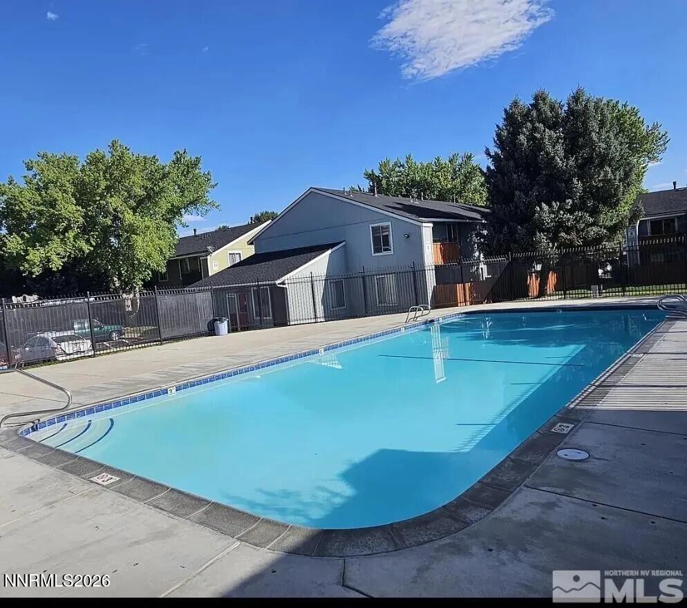 4608 Neil Road, Unit 269 Reno, NV 89502 - Photo 19 of 20 a view of a house with swimming pool