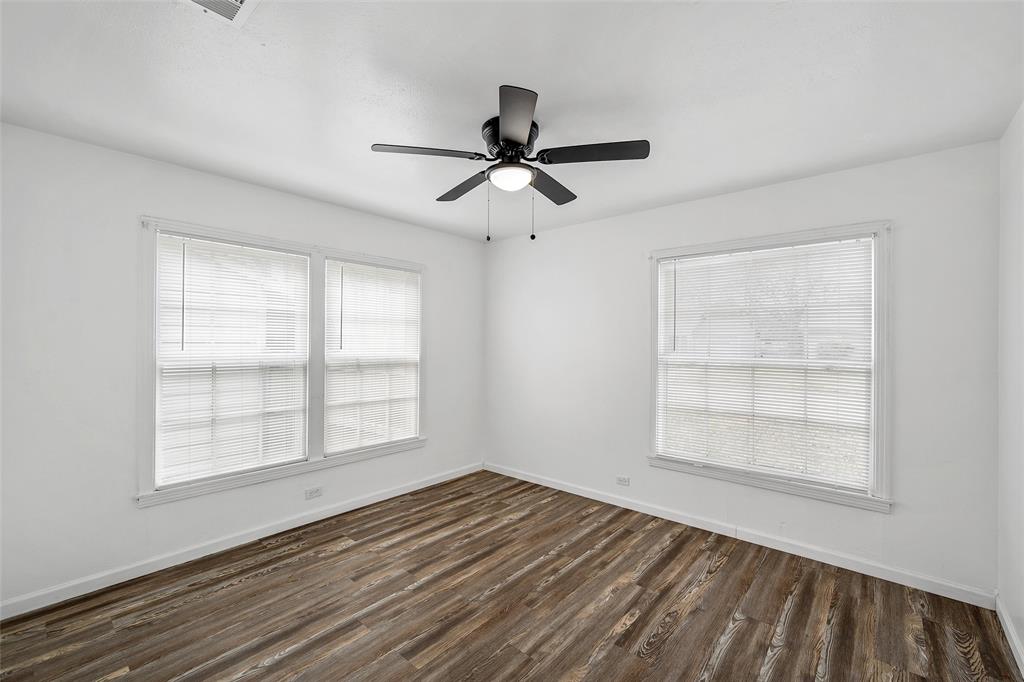3104 Fadal Avenue Waco, TX 76708 - Photo 14 of 17 a view of empty room with wooden floor and fan