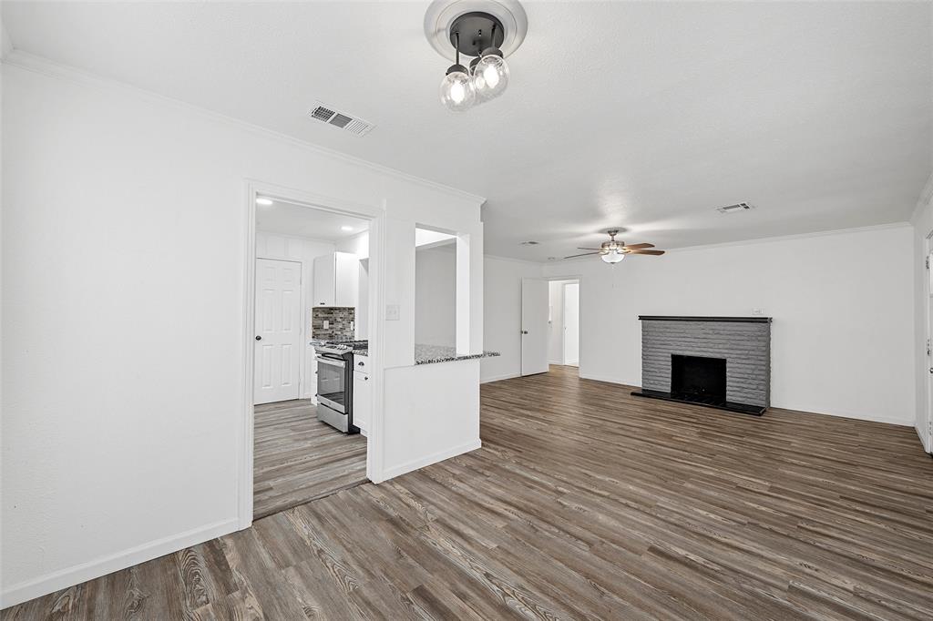 3104 Fadal Avenue Waco, TX 76708 - Photo 2 of 17 a view of a livingroom with a fireplace