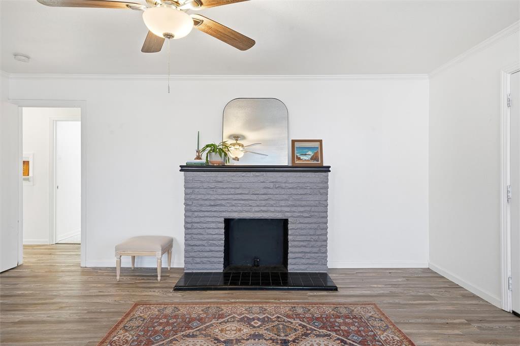 3104 Fadal Avenue Waco, TX 76708 - Photo 3 of 17 a living room with furniture and a fireplace