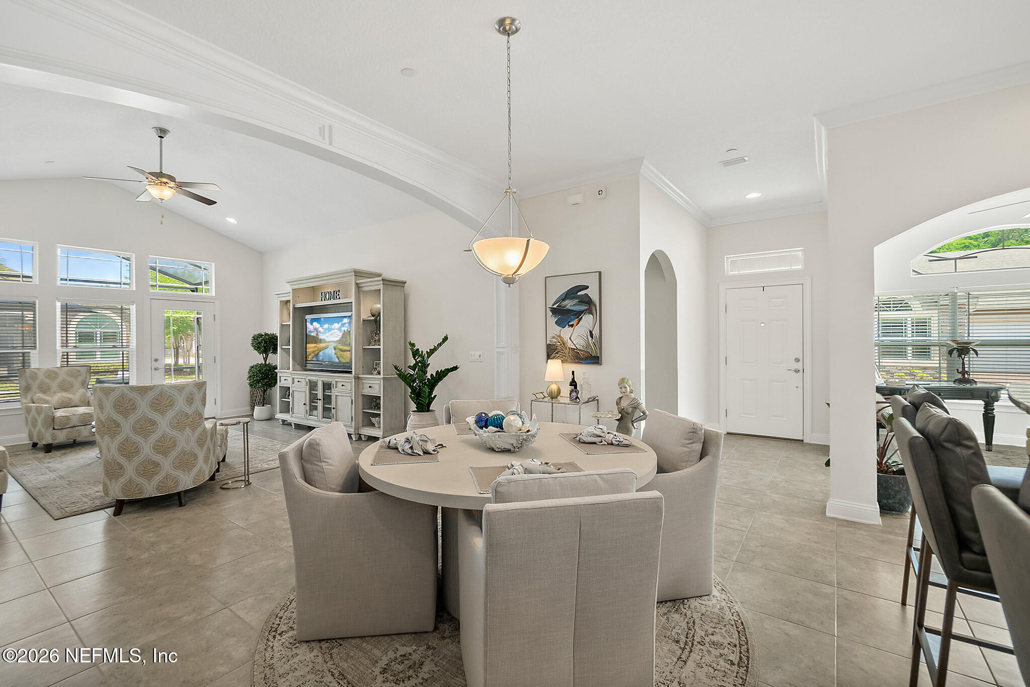 44 Utina Way St. Augustine, FL 32084 - Photo 13 of 48 a view of a dining room with furniture and chandelier
