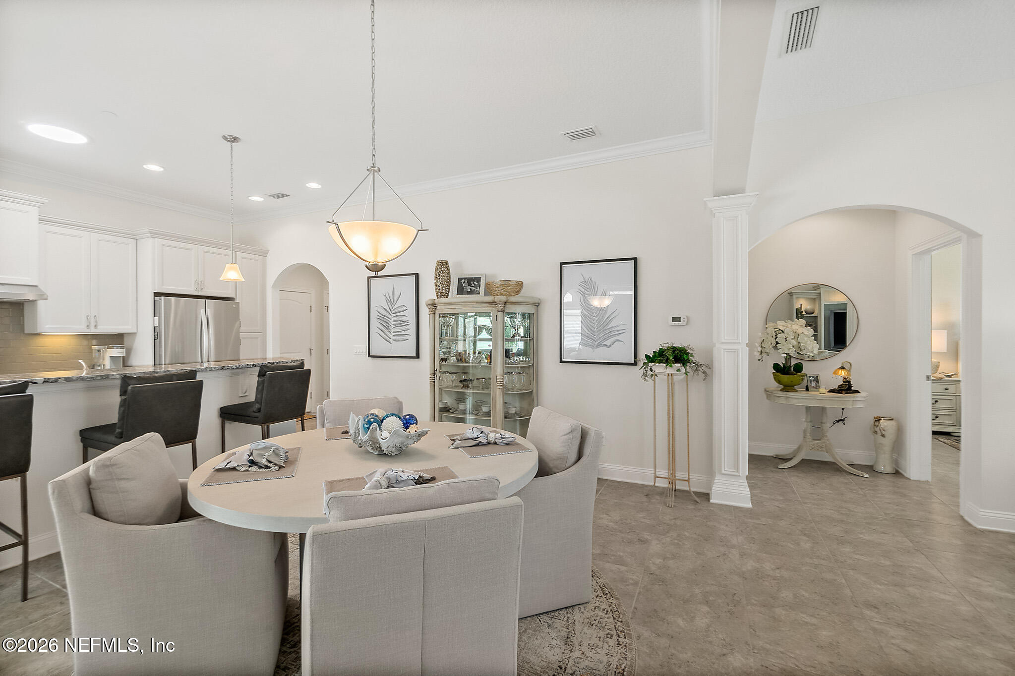 44 Utina Way St. Augustine, FL 32084 - Photo 15 of 48 a very nice looking dining room with a table and chairs
