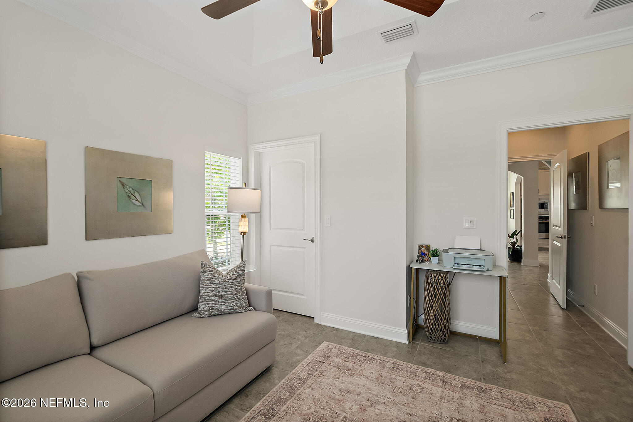 44 Utina Way St. Augustine, FL 32084 - Photo 27 of 48 a living room with furniture and a flat screen tv