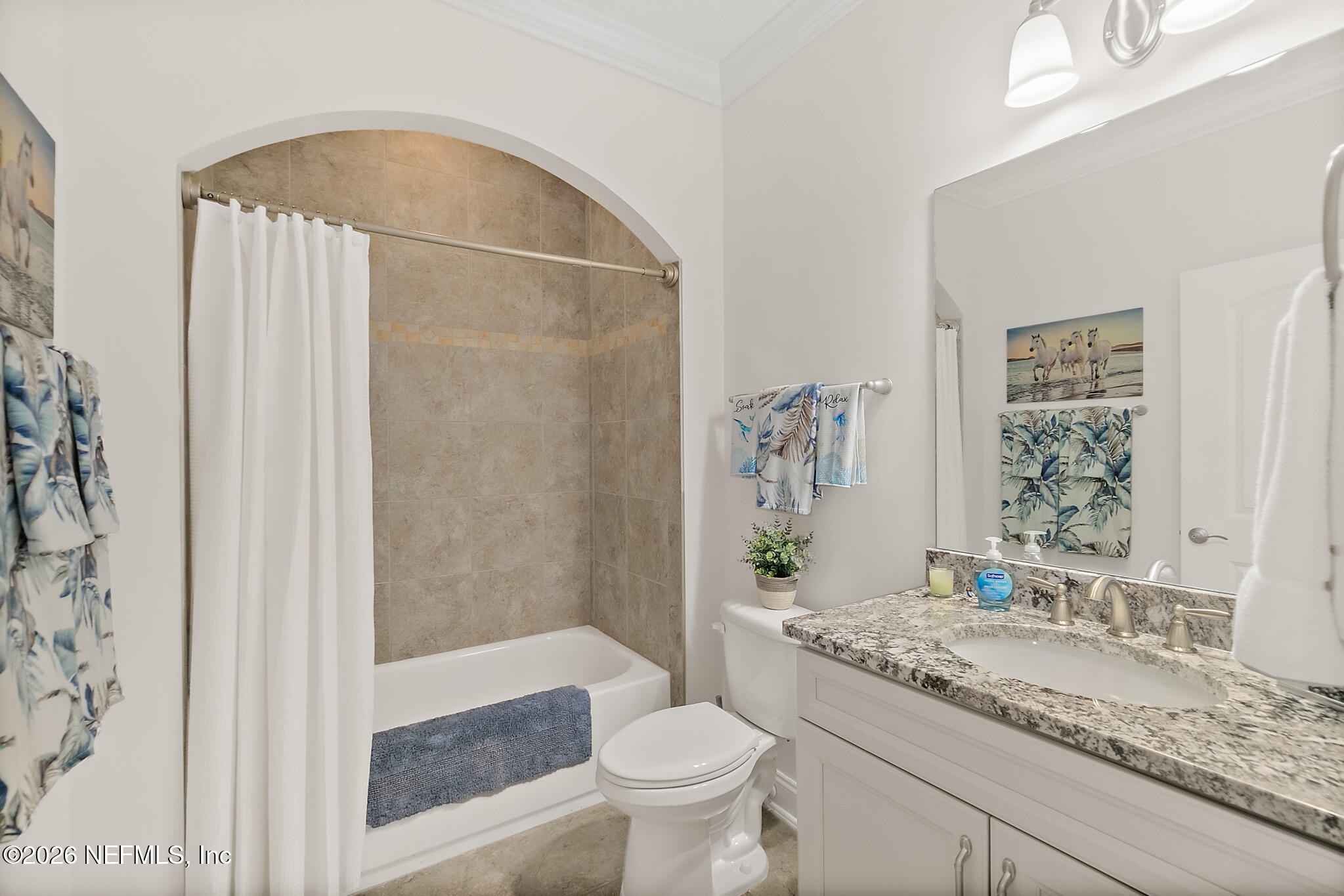 44 Utina Way St. Augustine, FL 32084 - Photo 28 of 48 a bathroom with a granite countertop sink toilet and shower