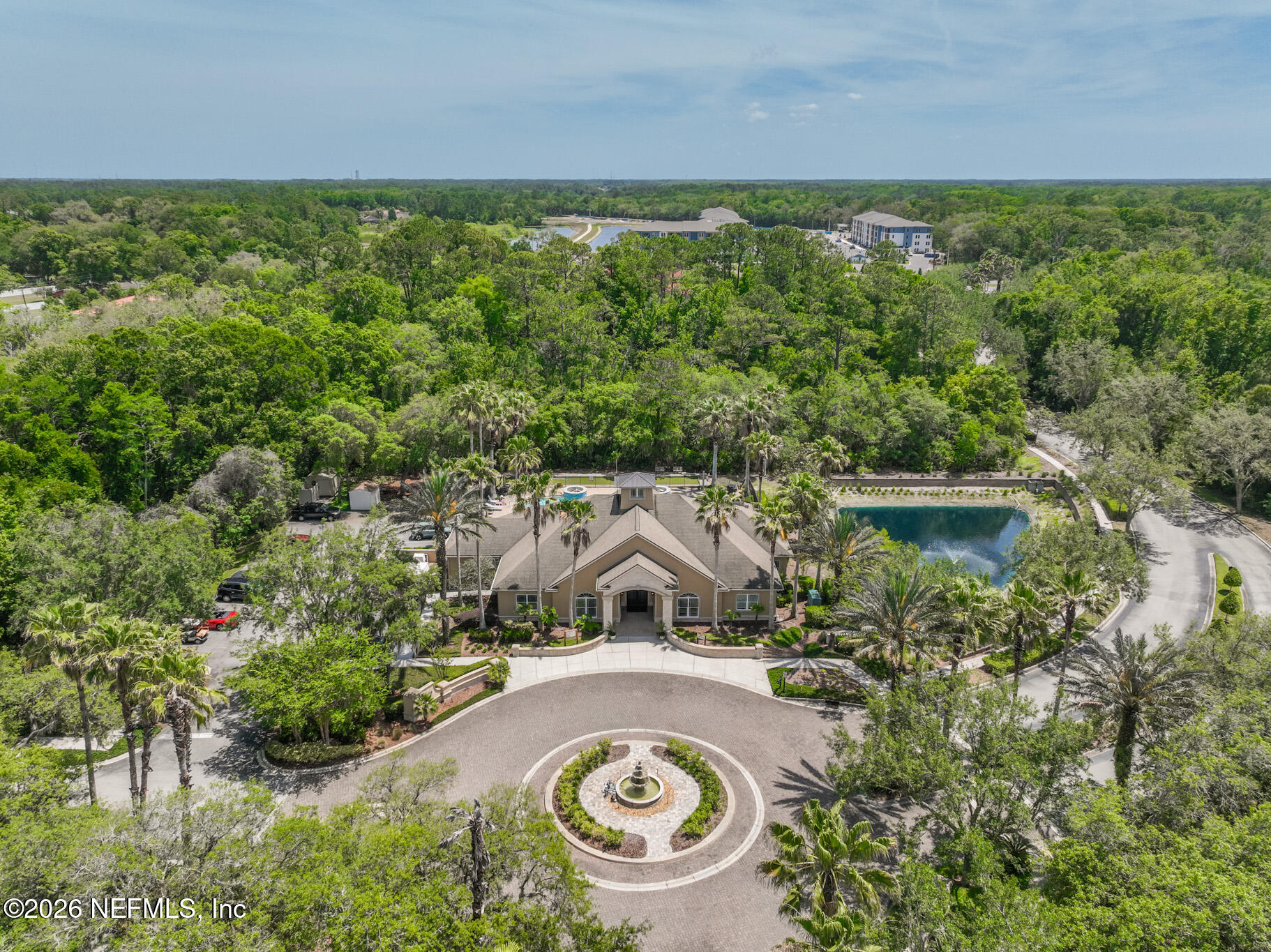 44 Utina Way St. Augustine, FL 32084 - Photo 32 of 48 an aerial view of a house with swimming pool and garden
