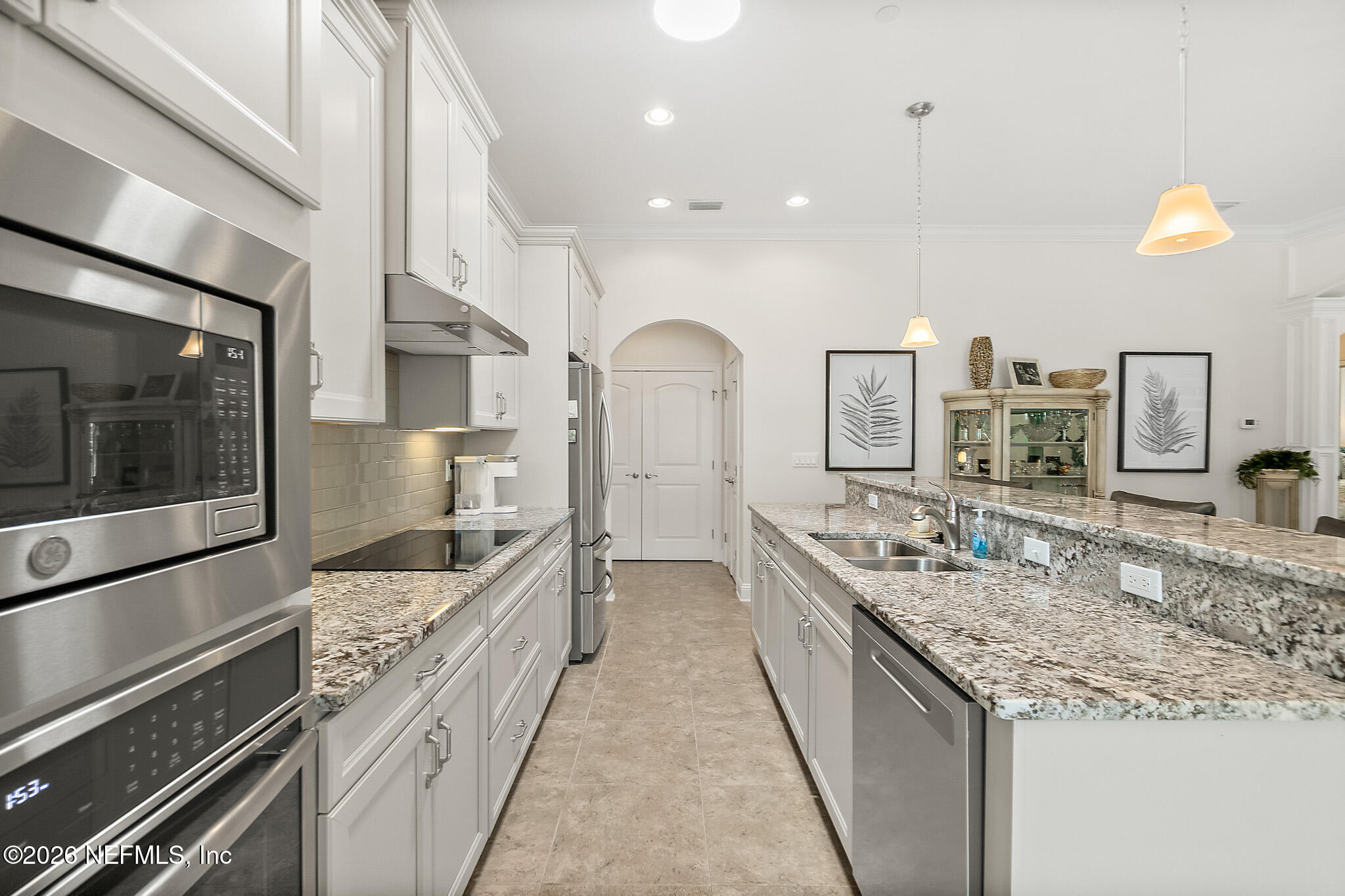 44 Utina Way St. Augustine, FL 32084 - Photo 8 of 48 a large kitchen with stainless steel appliances and a counter space