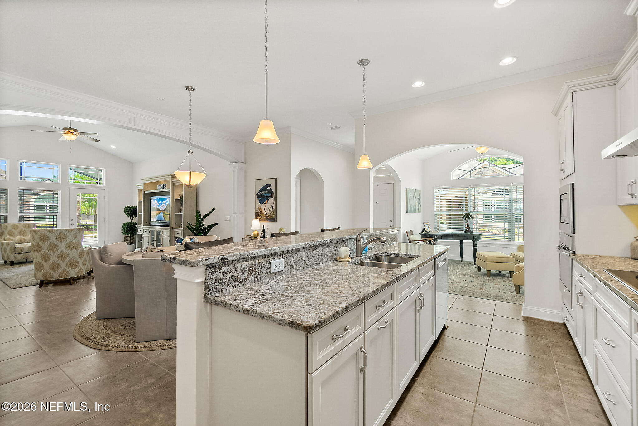 44 Utina Way St. Augustine, FL 32084 - Photo 9 of 48 a kitchen with a stove and a view of living room