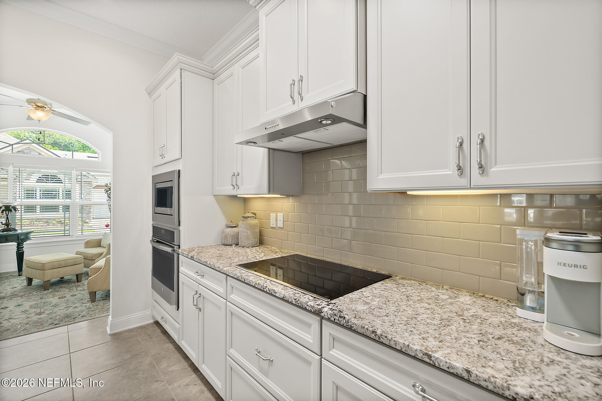 44 Utina Way St. Augustine, FL 32084 - Photo 10 of 48 a kitchen with stainless steel appliances granite countertop a sink stove and cabinets