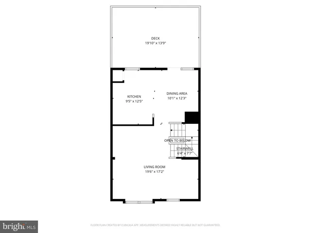 a picture of a bench in front of a wall