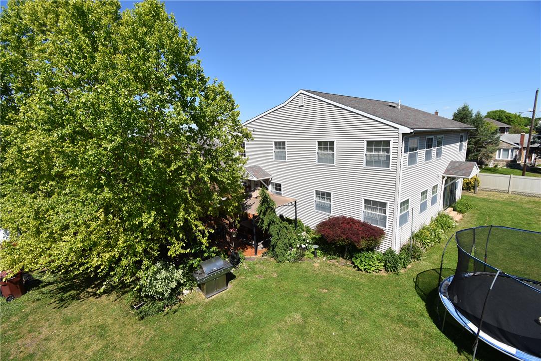 424 Grape Street Whitehall, PA 18052 - Photo 41 of 50 A classic two-story residence boasts a spacious fenced-in lawn and a private rear patio.