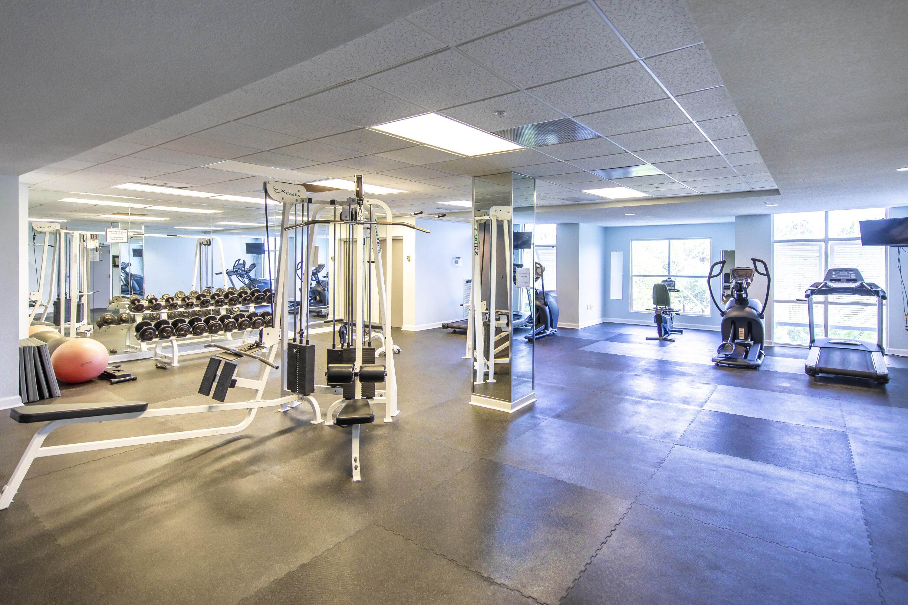 164 Blue Lupine Way, Unit 121 Santa Rosa Beach, FL 32459 - Photo 6 of 9 a view of a room with lots of gym equipment