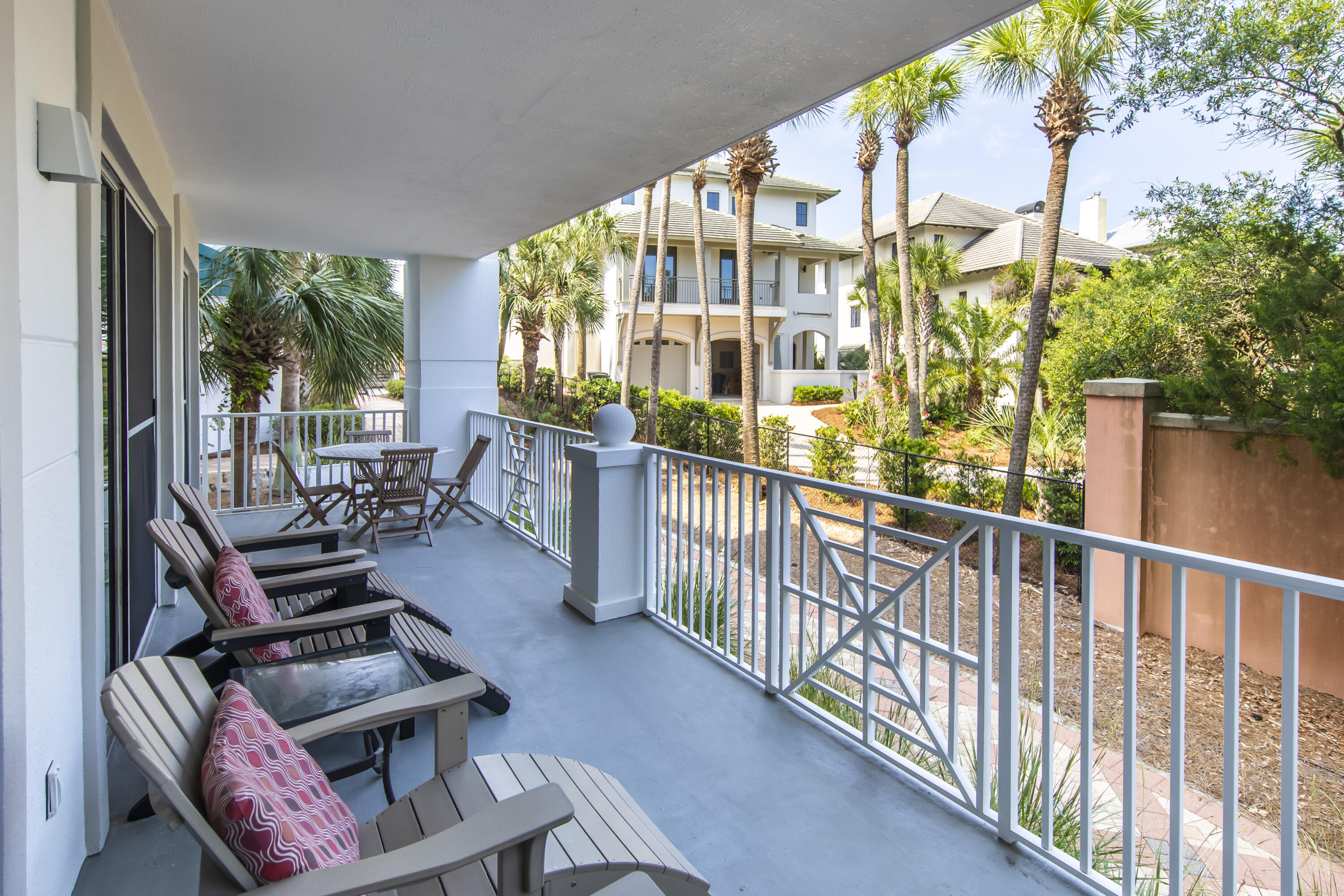 164 Blue Lupine Way, Unit 121 Santa Rosa Beach, FL 32459 - Photo 7 of 9 a view of a porch with furniture