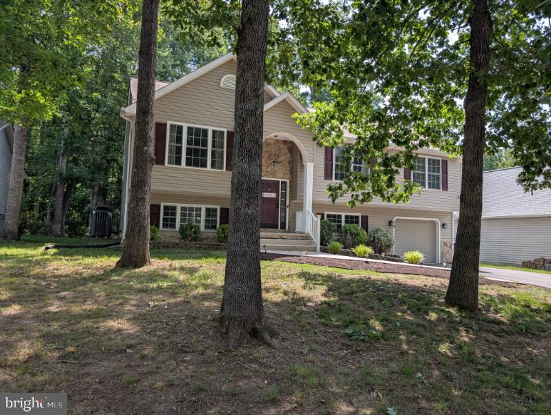 front view of house with a yard