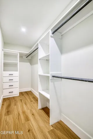 a view of a livingroom with a refrigerator