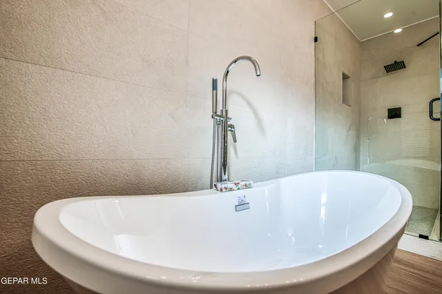 a view of a yard with a porch and plants